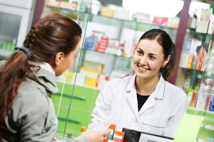 Pharmacy assistant helps patient