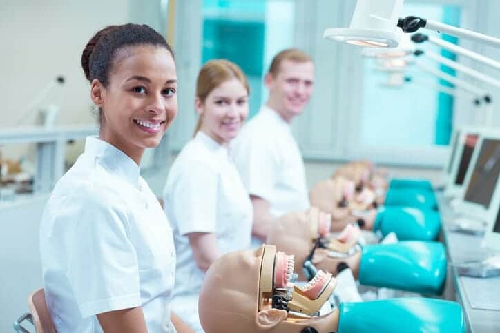 female dental assistant smiling