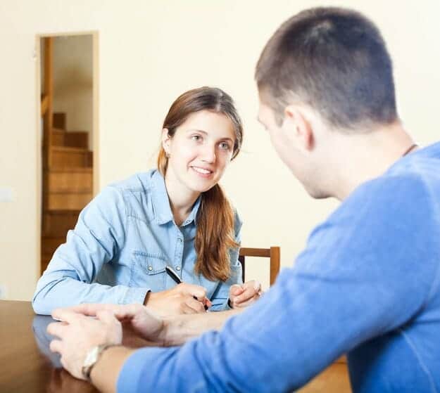 female counsellor talking to male