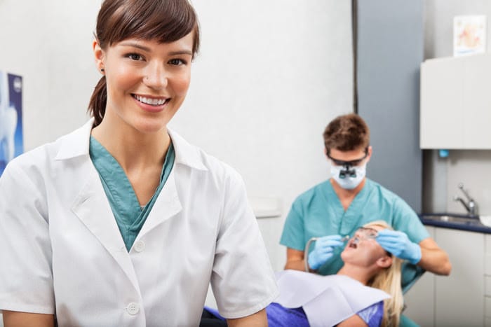 dental assistant smiling in photo