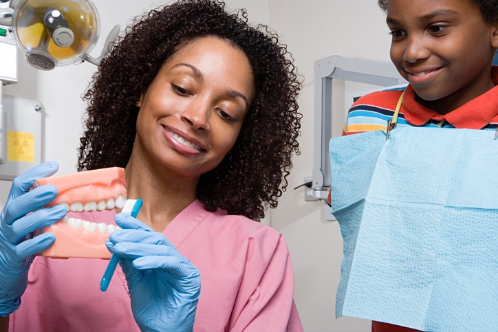 You can use your knowledge from dental assistant school to help children feel safe