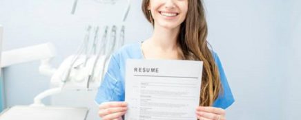 Young dentist with resume
