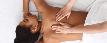 Shot Of An Attractive Young Woman Getting A Massage At A Spa