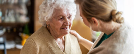 A PSW grad practicing GPA dementia care with an elderly client