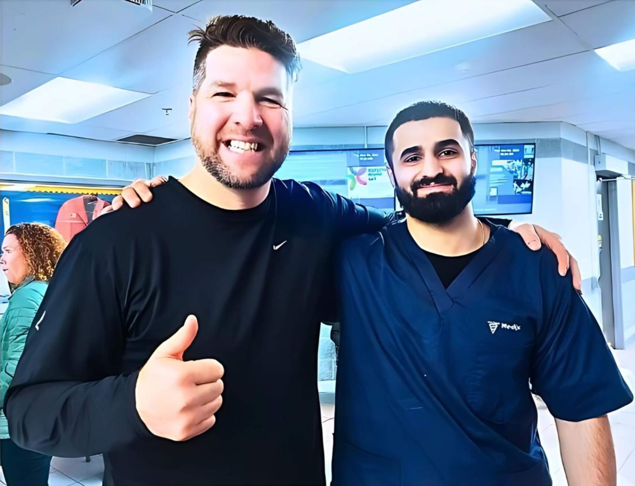 Two Medix College students smiling and posing, exemplifying the connection made through online and in-person classes.