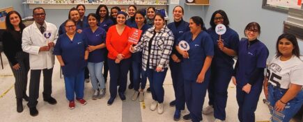 A class of pharmacy assistant program students in a lab