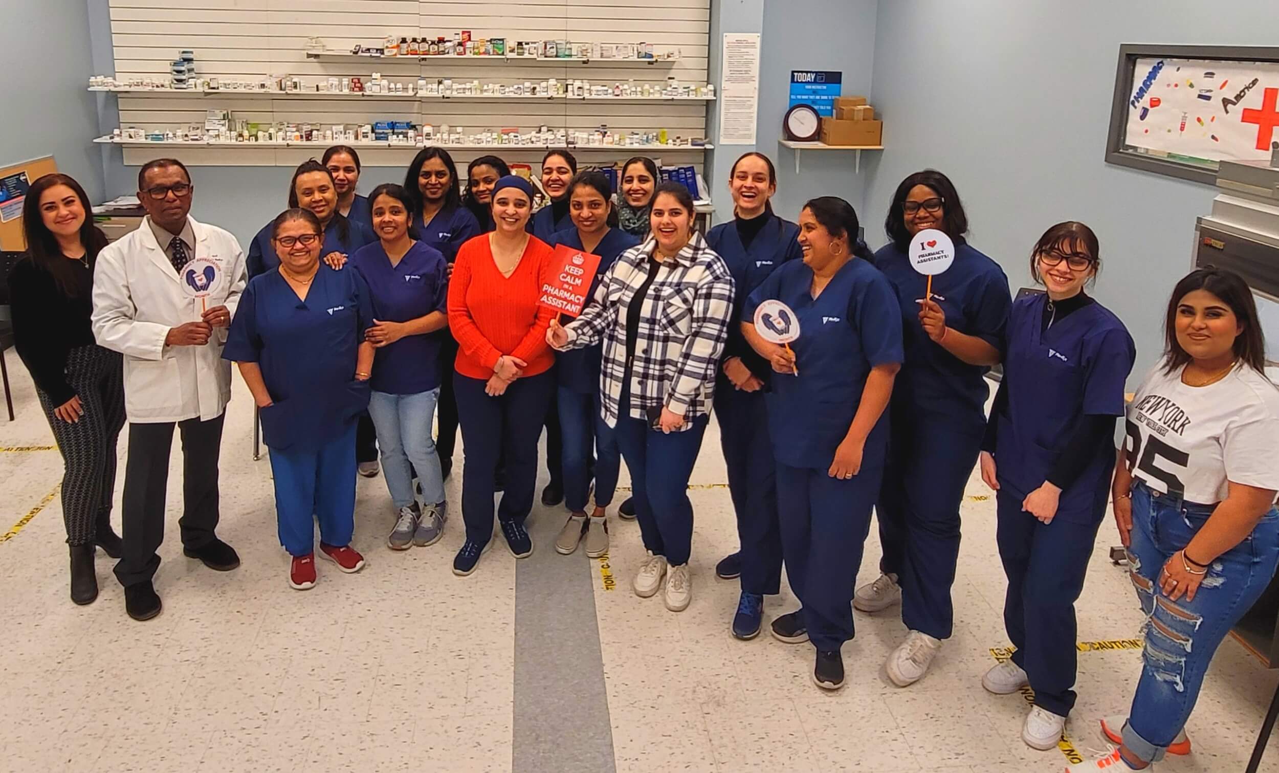 A class of pharmacy assistant program students in a lab