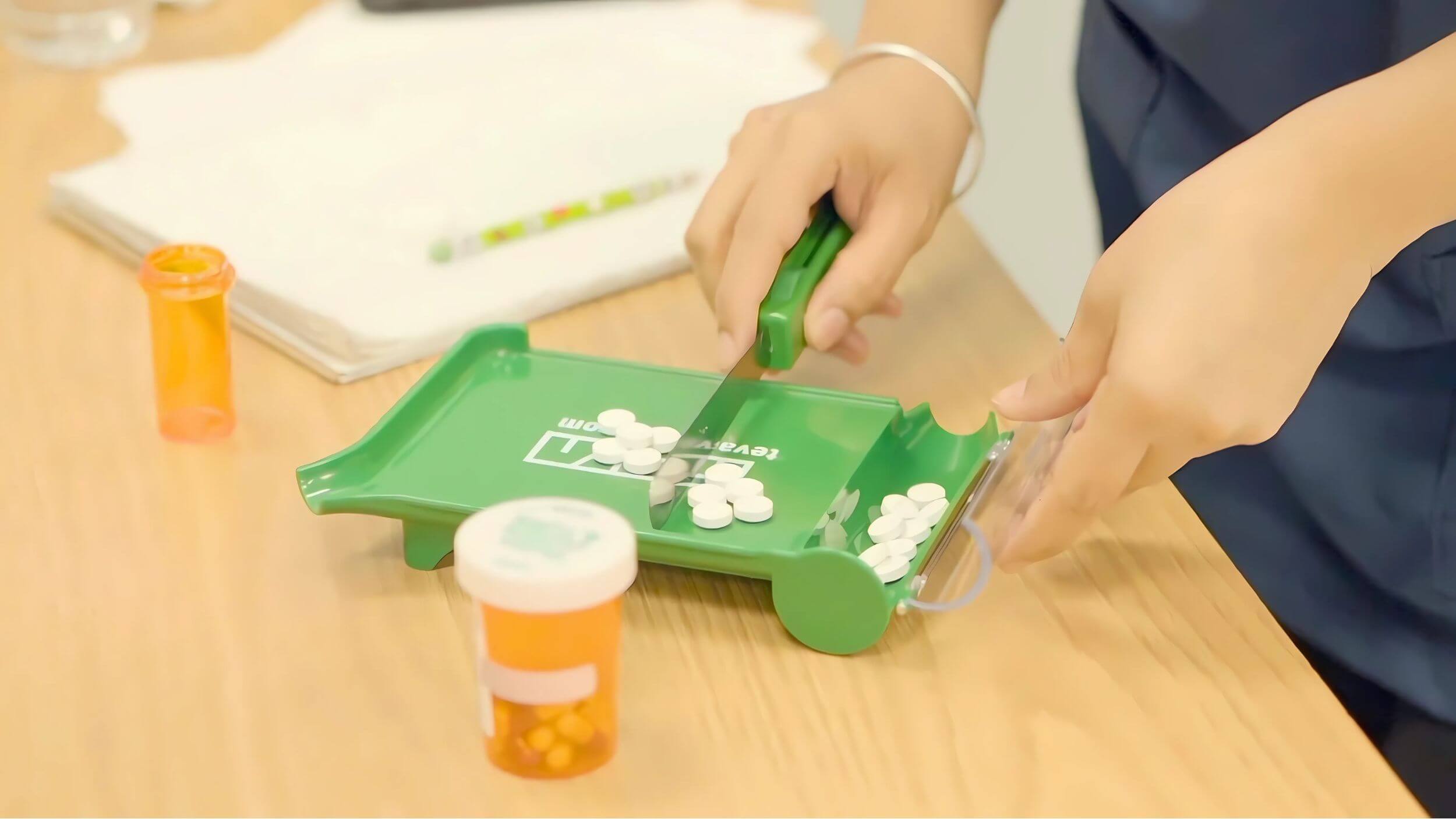 A student in the pharmacy assistant program practicing dispensing medication