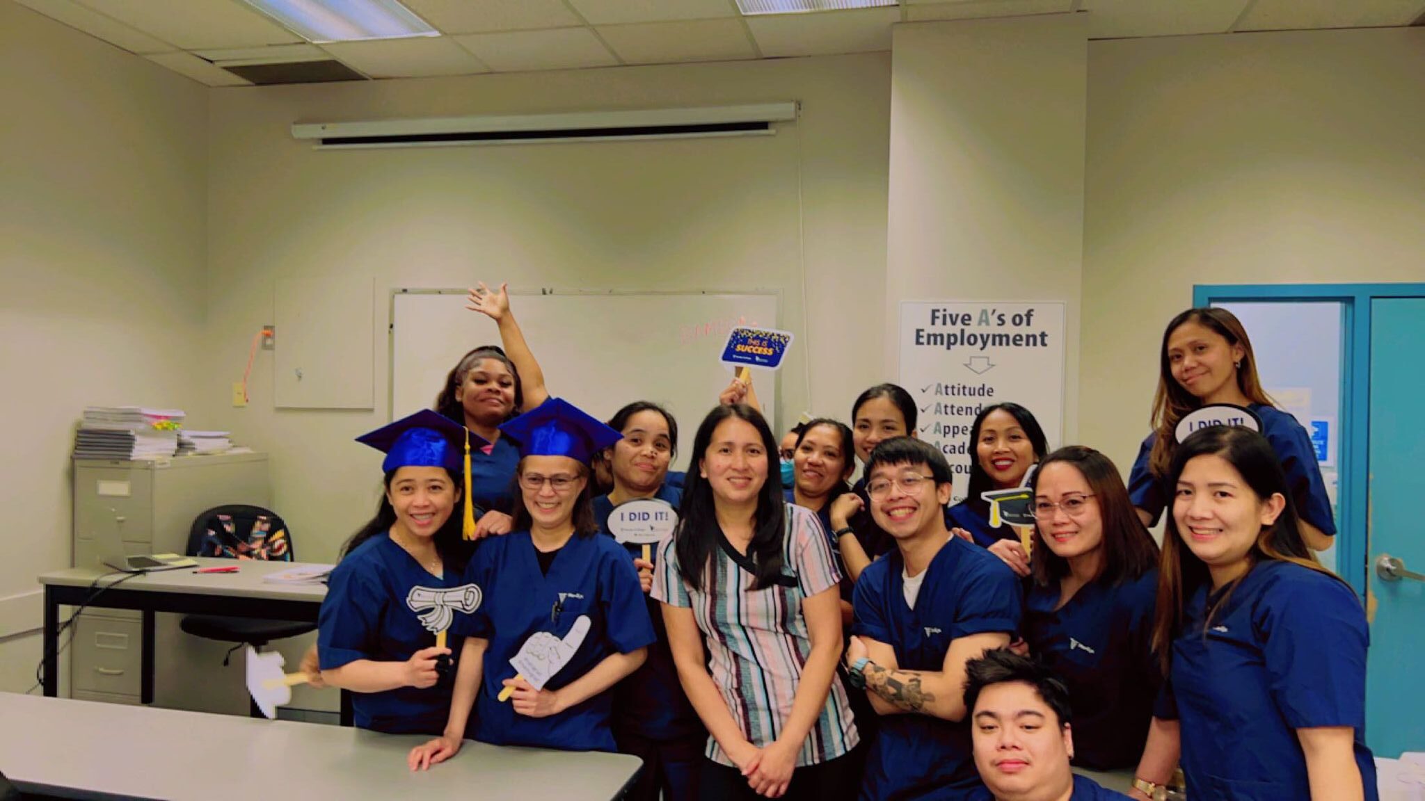 Smiling graduating students after receiving career-ready education at Medix College
