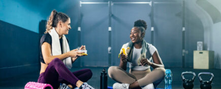 A professional nutrition coach working with a client, showcasing personal one-on-one consultation, highlighting health and fitness career opportunities.