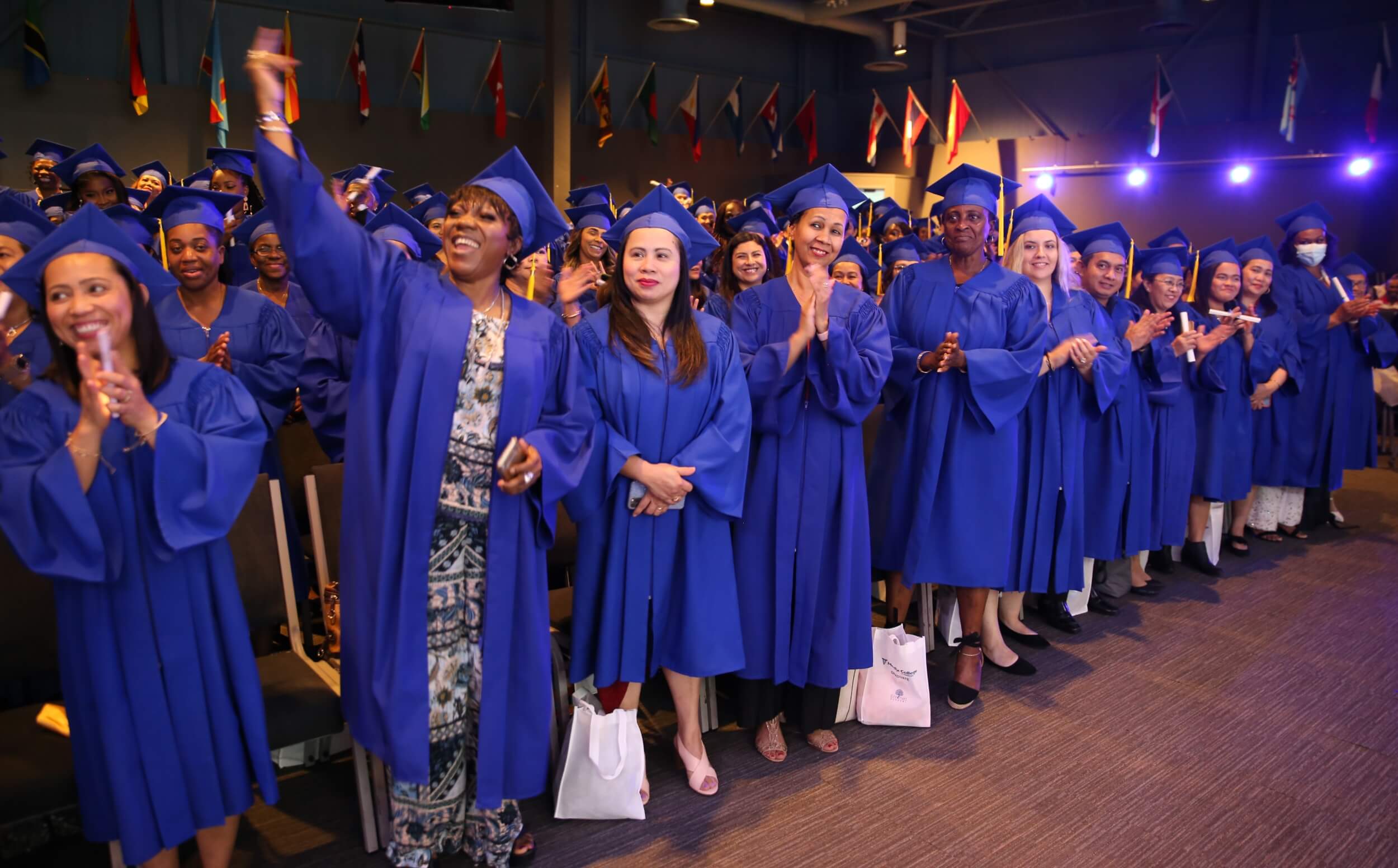A class of flexible learning Medix students celebrating their graduation
