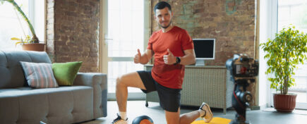 An online fitness coach leading a virtual workout session