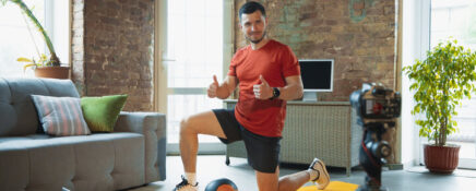 An online fitness coach leading a virtual workout session